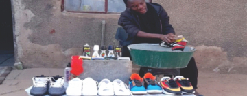 Excluded student survives off sneaker-washing